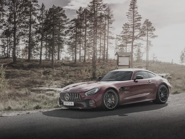 Sample image, digitally altered to look scuffed: a red sports car